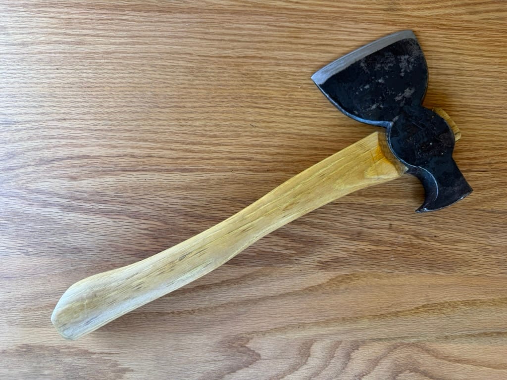 Restored E.C. Simmons Keen Kutter roofing hatchet with its original age and working character preserved