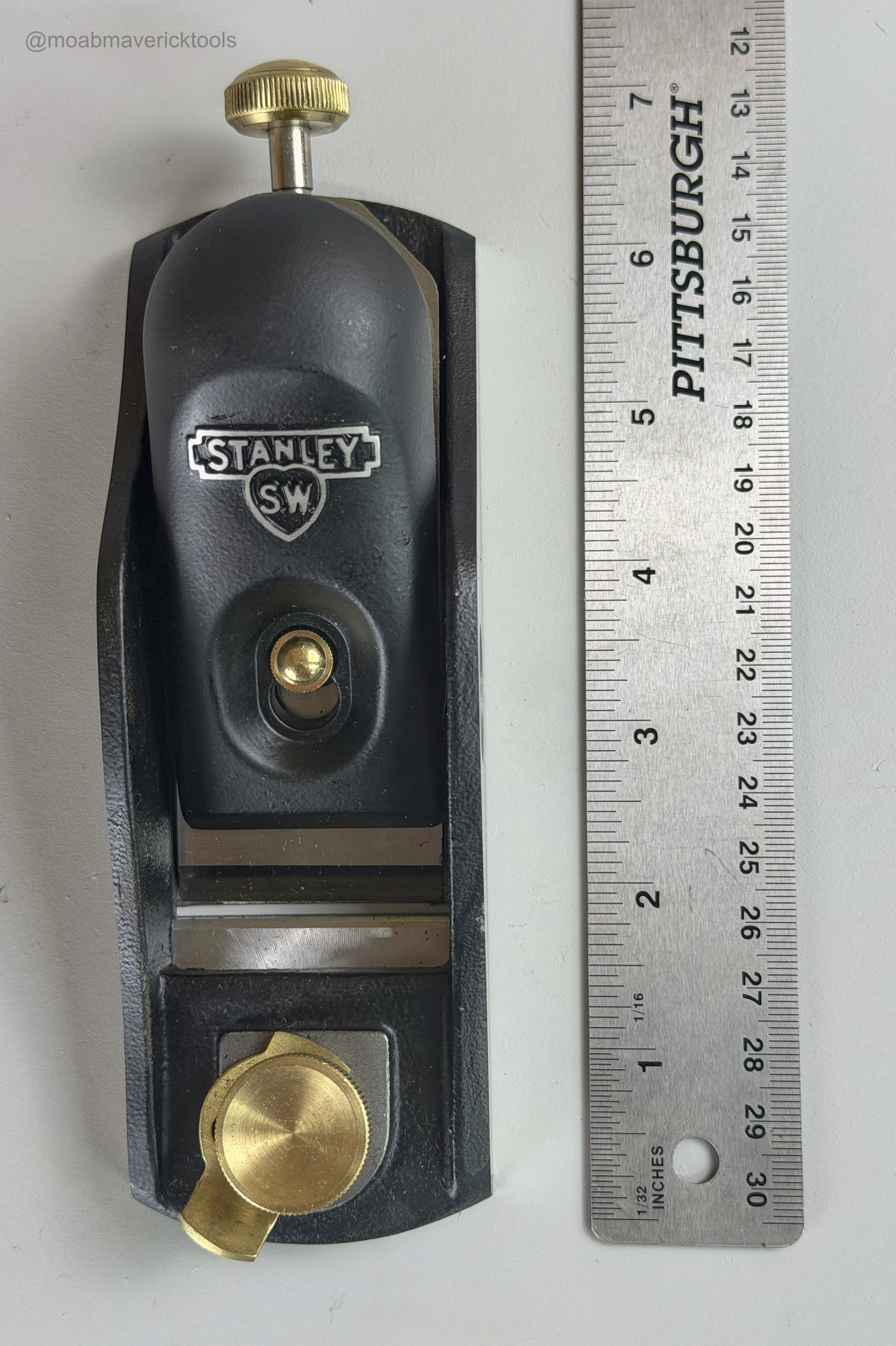Top view of Stanley No. 60½ low-angle block plane beside ruler showing overall length