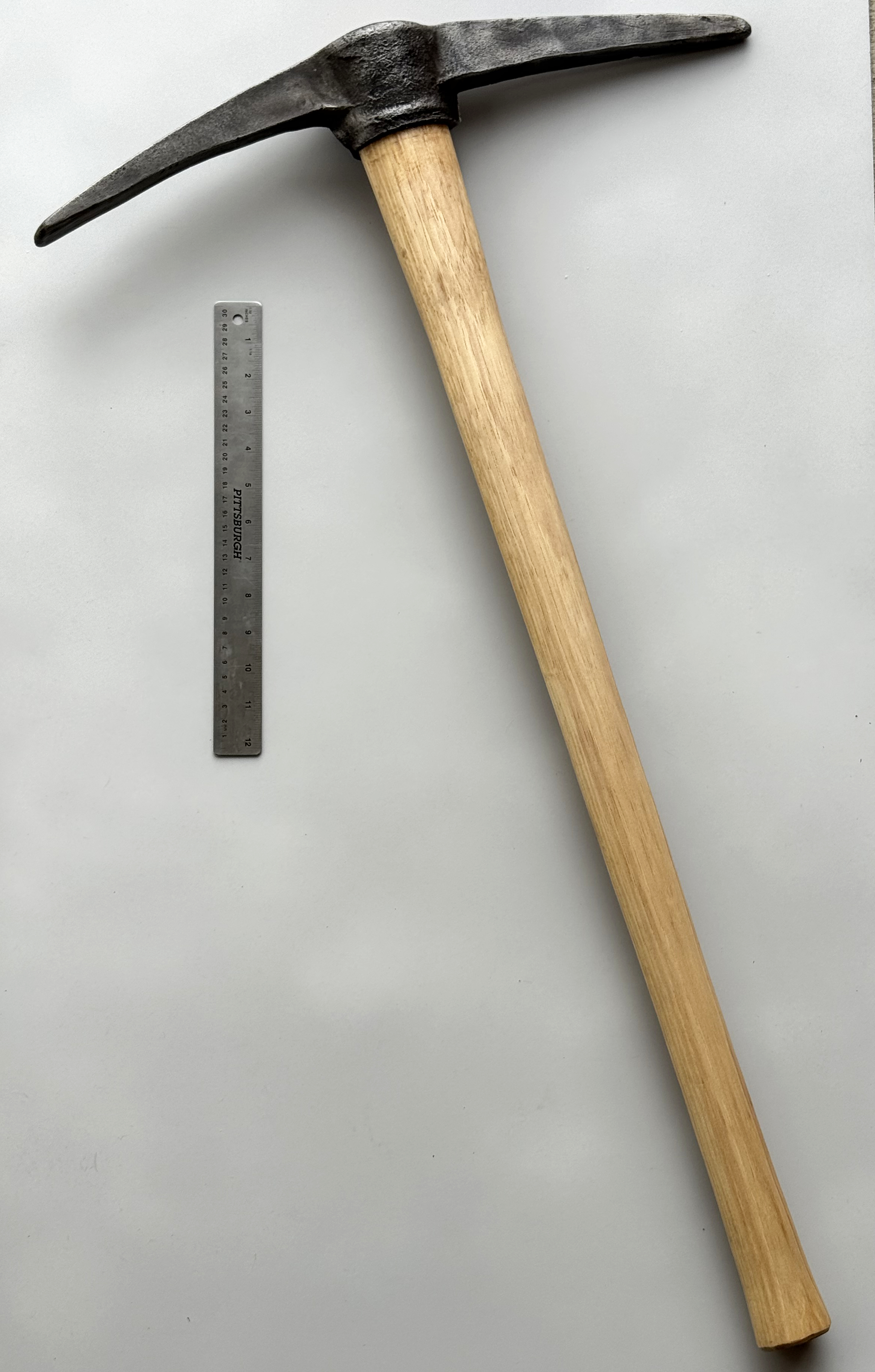 Product photo of Vintage forged pickaxe – restored head on new hardwood handle
