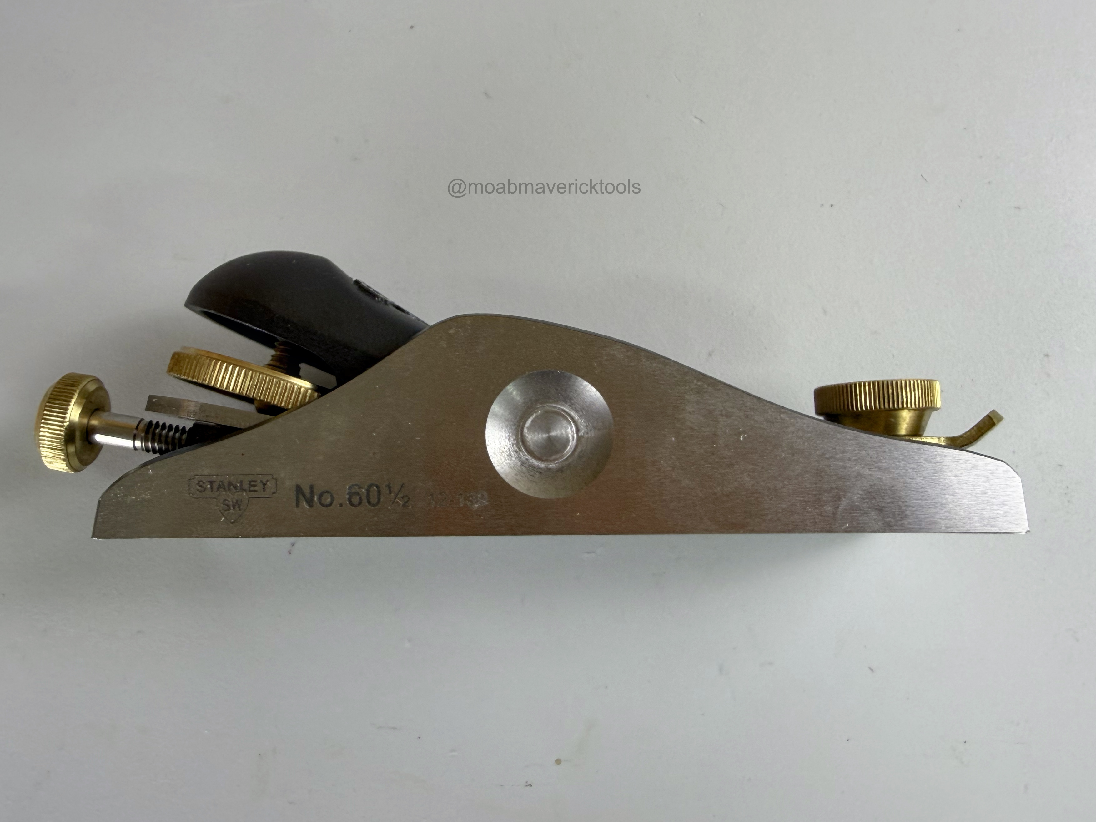 Side view of Stanley No. 60½ low-angle block plane with brass adjustments